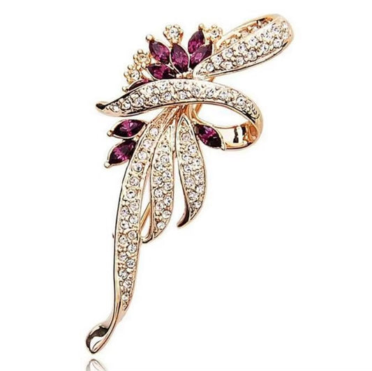 Elegant gold brooch with wine stones for sarees and shawls