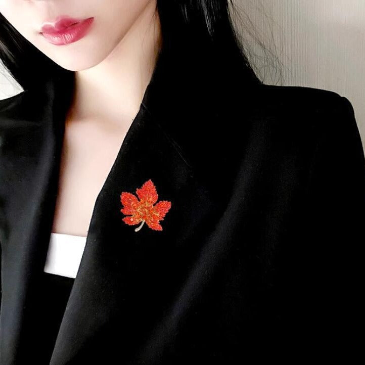 Autumn-inspired luxury brooch in red-orange tones