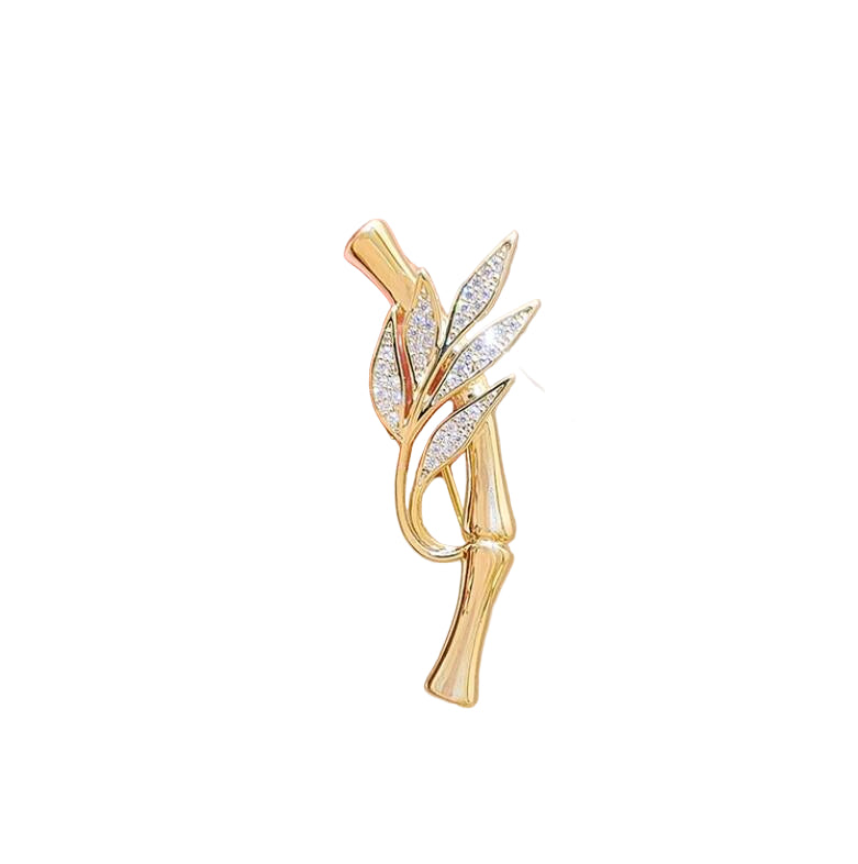 Elegant bamboo leaf brooch with crystals in gold finish