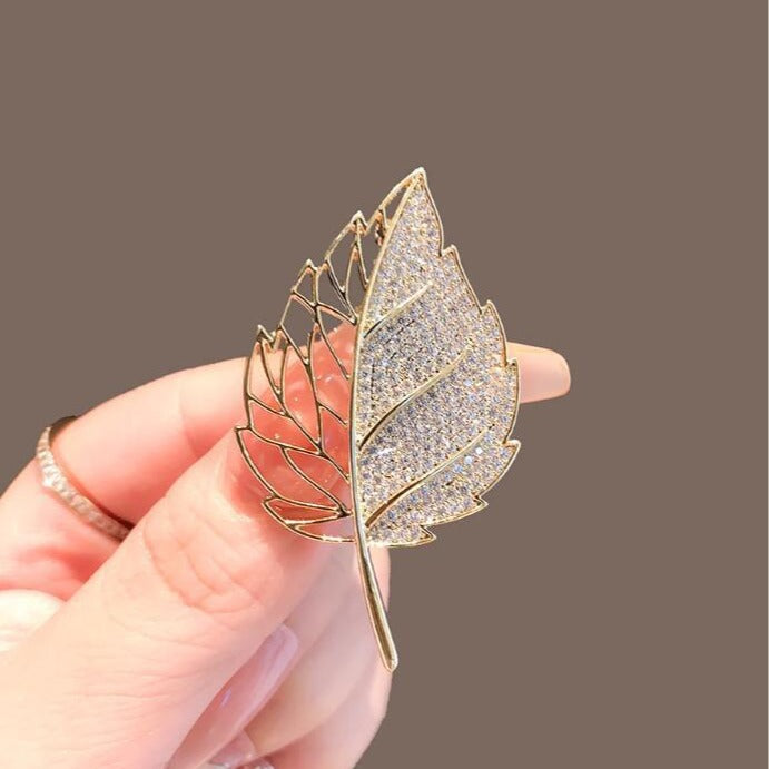Elegant crystal leaf brooch for saree or formal blazer