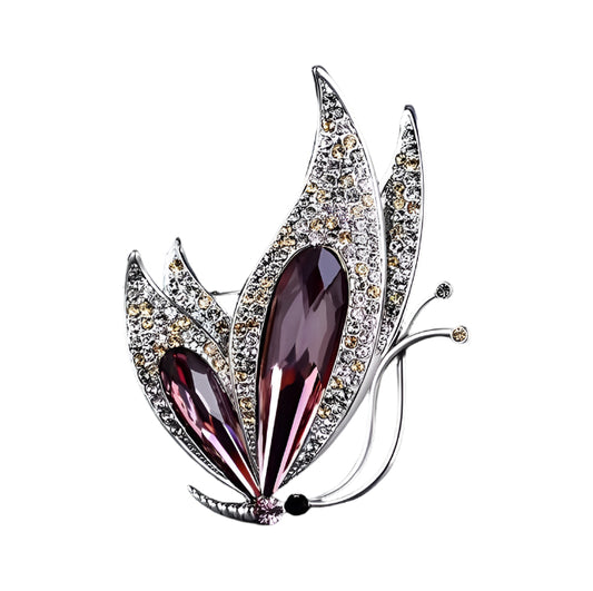 Elegant silver butterfly brooch with purple crystals