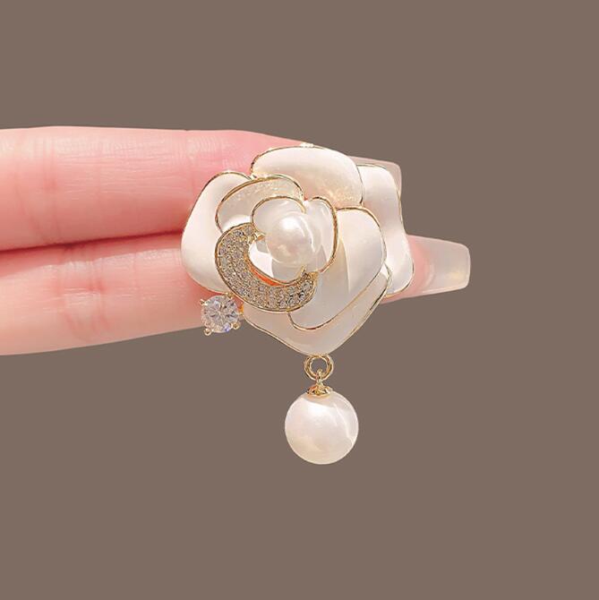 Luxury floral brooch with white petals and pearl drop