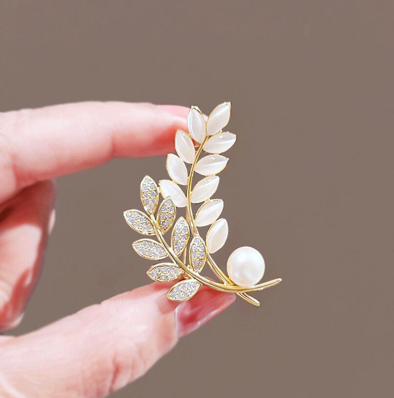 Mini crystal brooch with pearl accent for sarees or scarves

