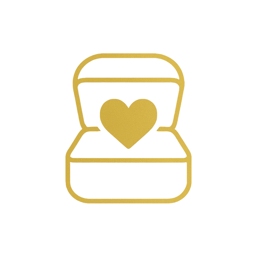Gold ring box with a heart-shaped gem on a beige background