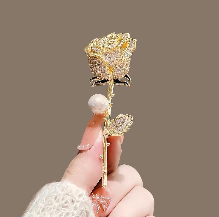 Statement crystal rose brooch with pearl accent