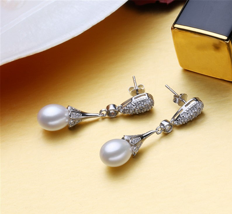 Elegant white pearl dangle earrings