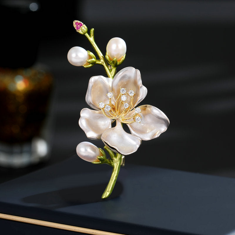 Hand-painted enamel pearl brooch in floral design

