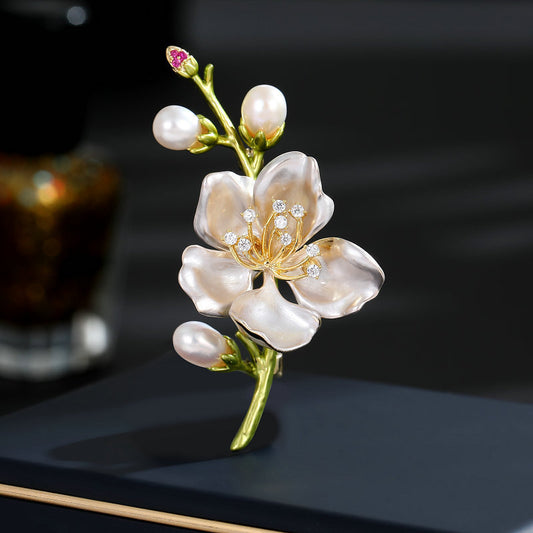 Hand-painted enamel pearl brooch in floral design

