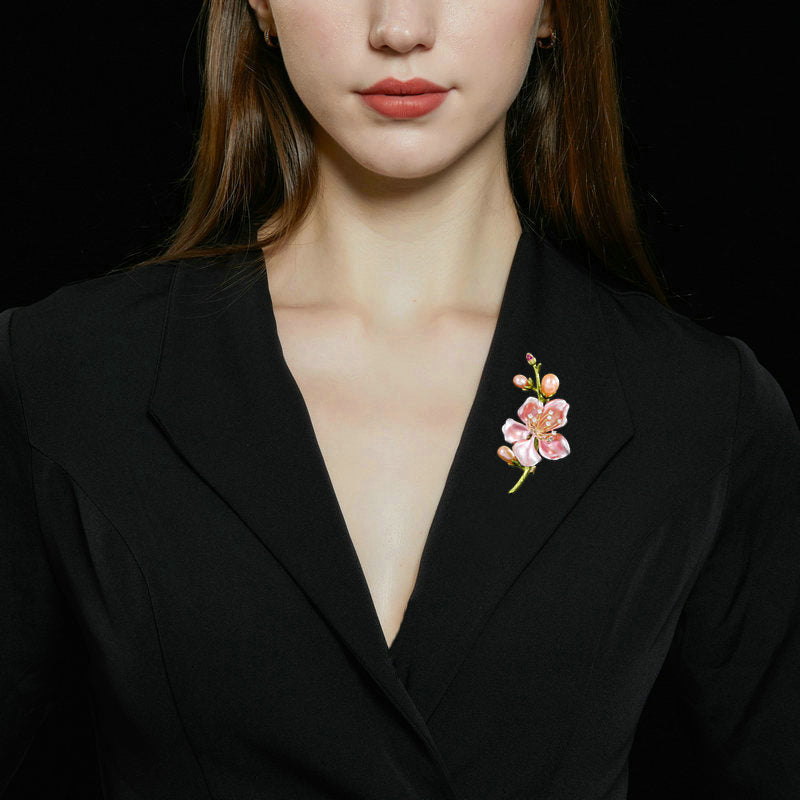Elegant gold plated brooch with faux pearls and crystals