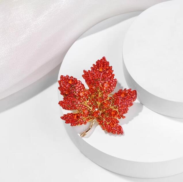 Handcrafted maple leaf brooch in red 