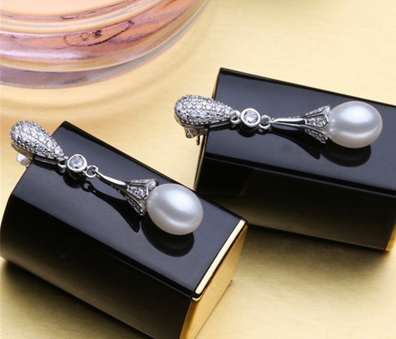8mm AAA-grade white pearl earrings with zirconia