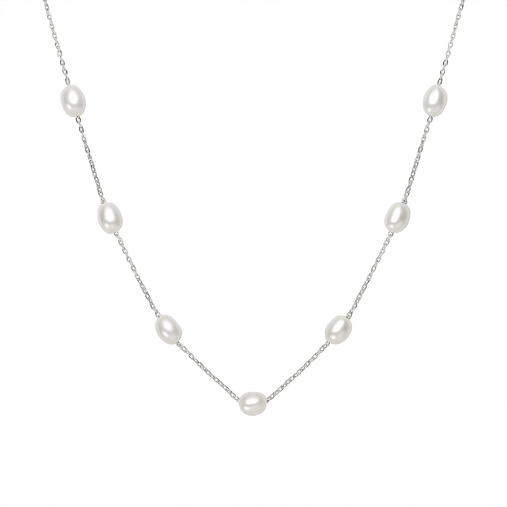 Floating freshwater pearl necklace with sterling silver chain and spaced natural pearls.