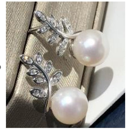 Elegant pearl and silver leaf earrings
